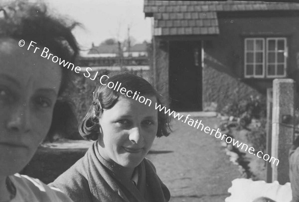 WOMAN AT RAILWAY COTTAGES